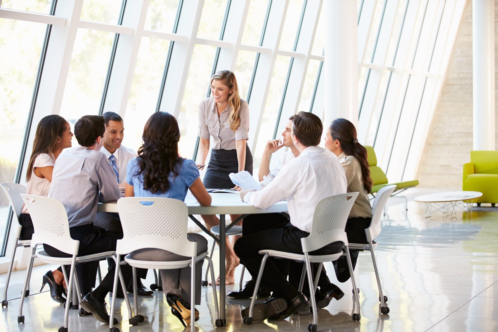 A diverse team collaborates in a bright training room, showcasing Career Calling International's commitment to vet.