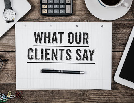 A notepad on a desk shows client feedback, highlighting the value of our vet compliance services.