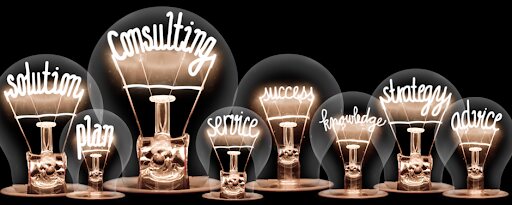 Lightbulbs illustrate consulting services, solutions and strategy for business success.